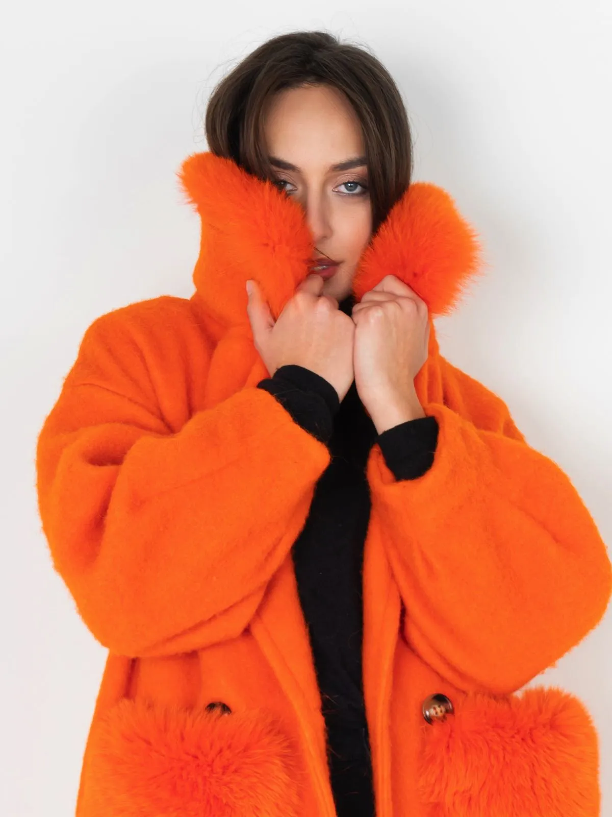 Coat with pockets and collar in orange fox