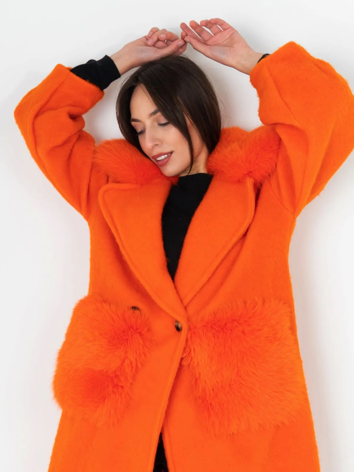 Coat with pockets and collar in orange fox