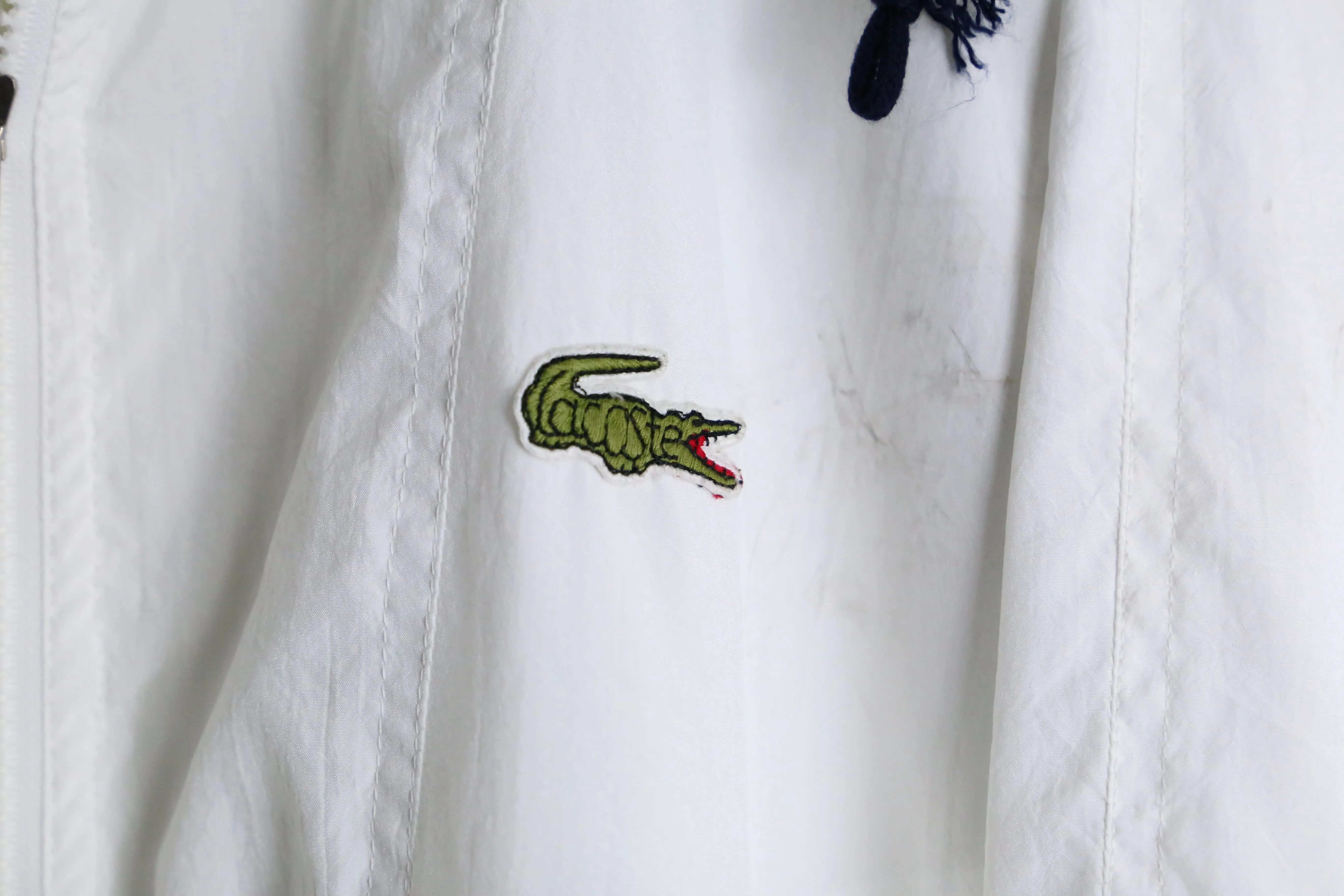 “LACOSTE” white nylon track jacket