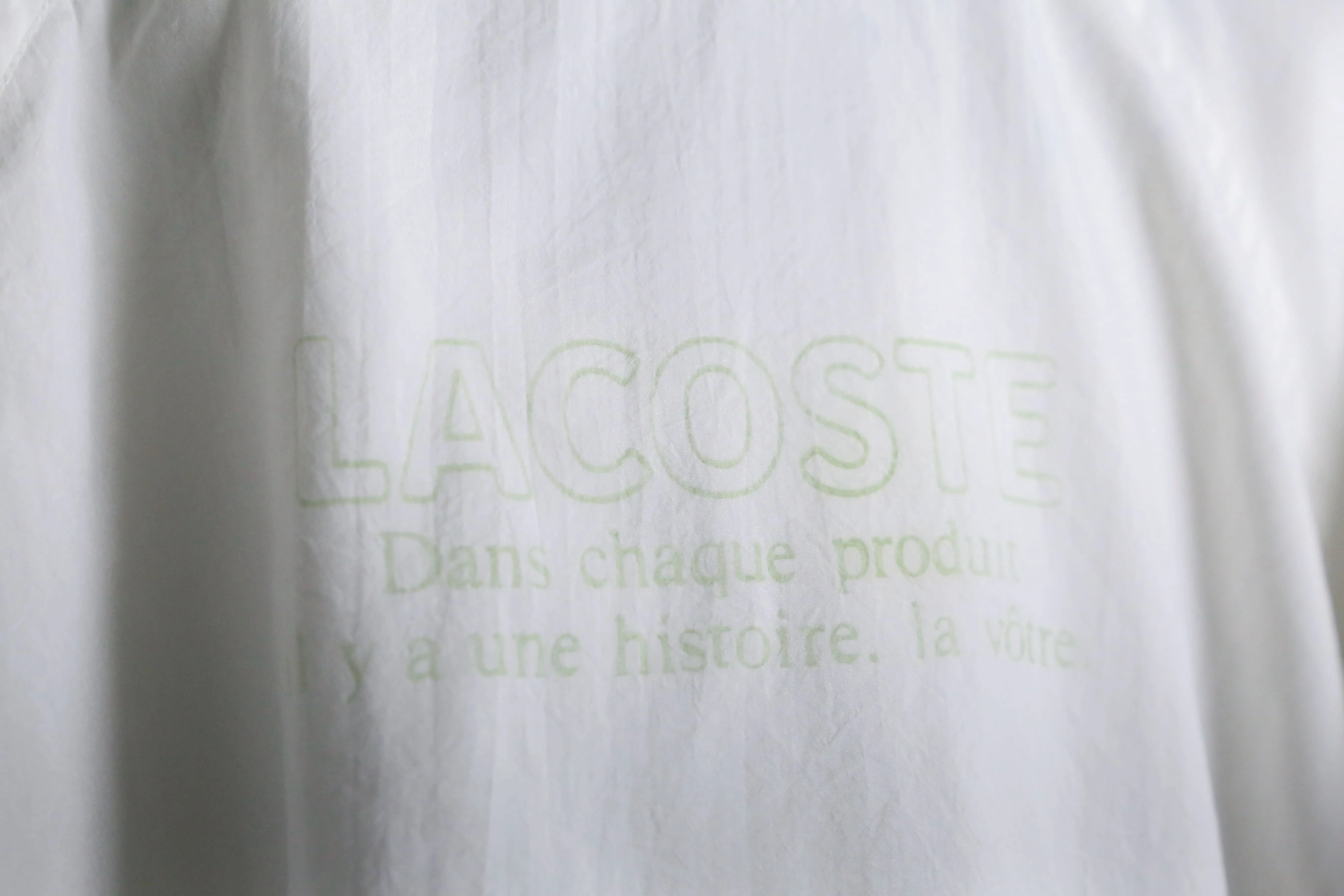 “LACOSTE” white nylon track jacket